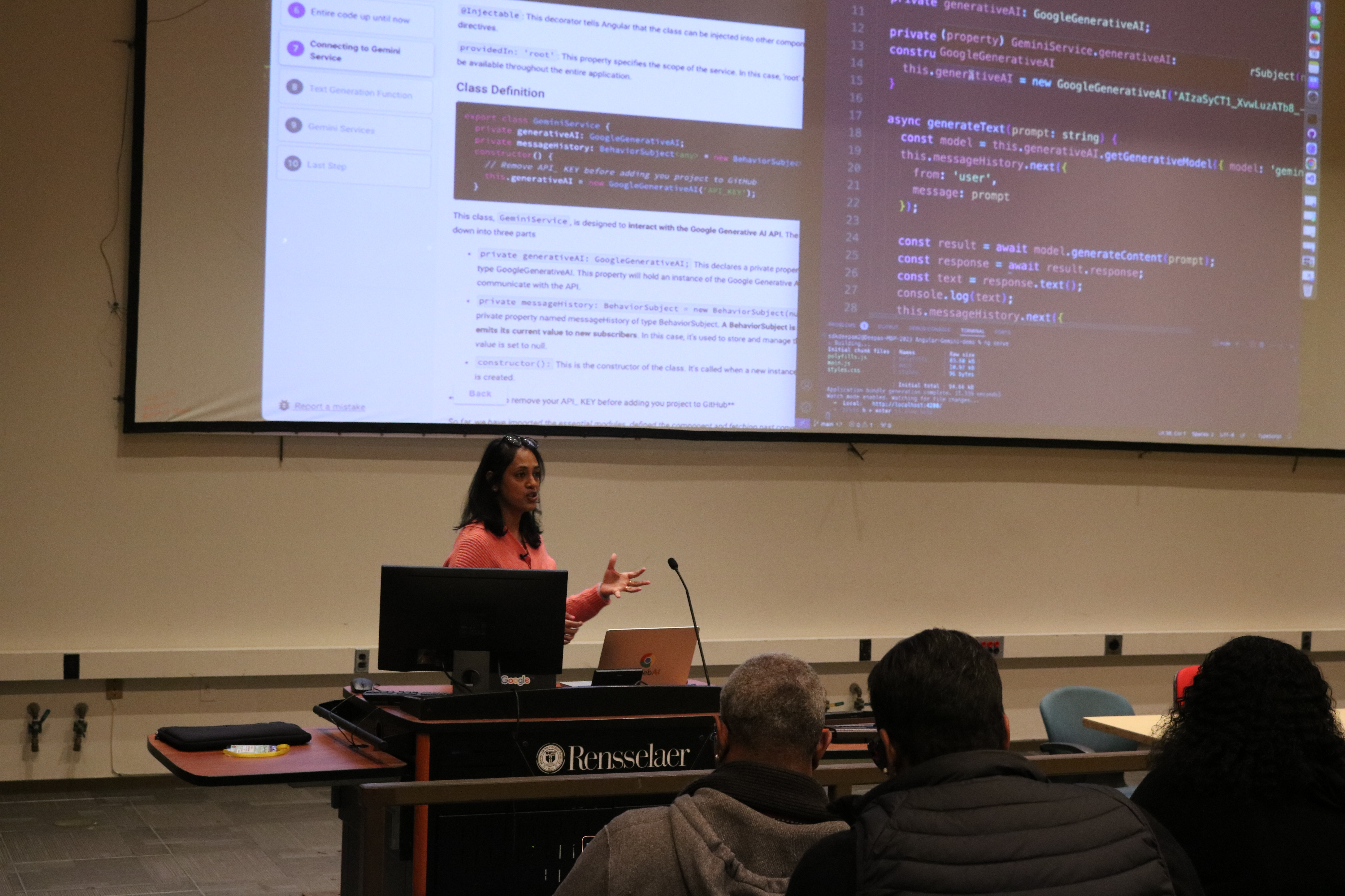 Deepa speaking at a conference